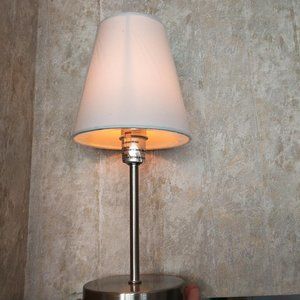 Basic White 10 inch Table lamp. New in box. Silvertone base. Simple Designs